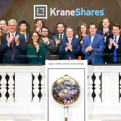 The KraneShares leadership team ringing the bell at the New York Stock Exchange, where many KraneShares ETFs are listed